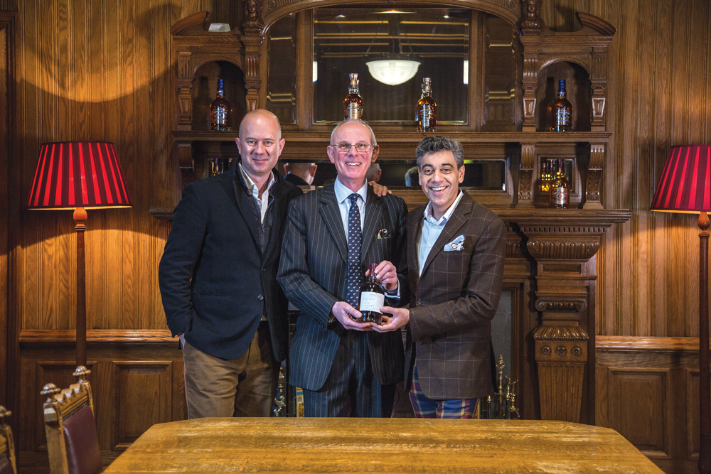 Quentin Job, Colin Scott and Deepak Ohri at the distillery in Scotland